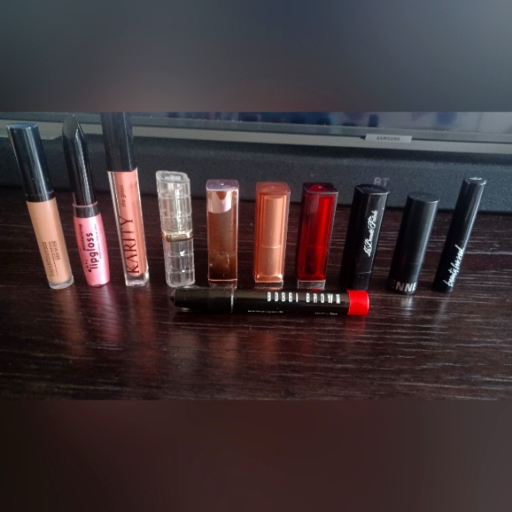 Lot of lipsticks and lipgloss assorted brands and colors